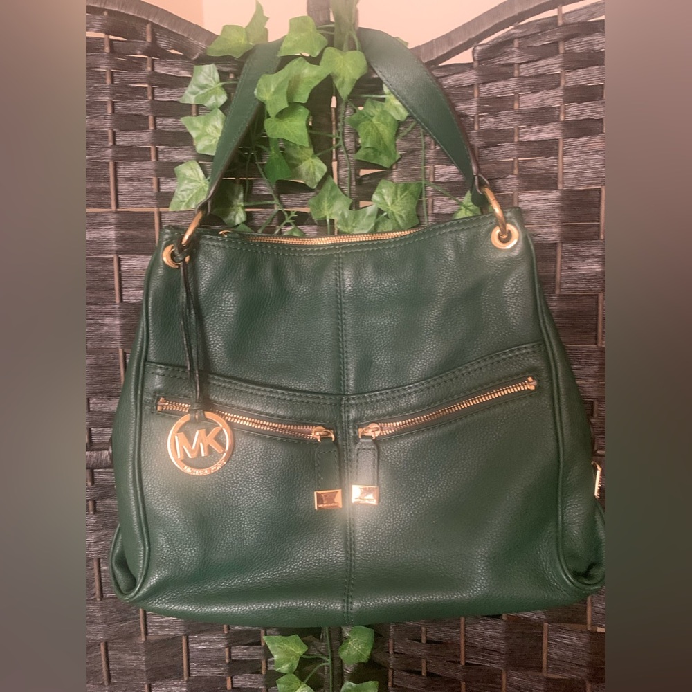 Michael Kors Layton green pebble leather hobo with zip pockets.